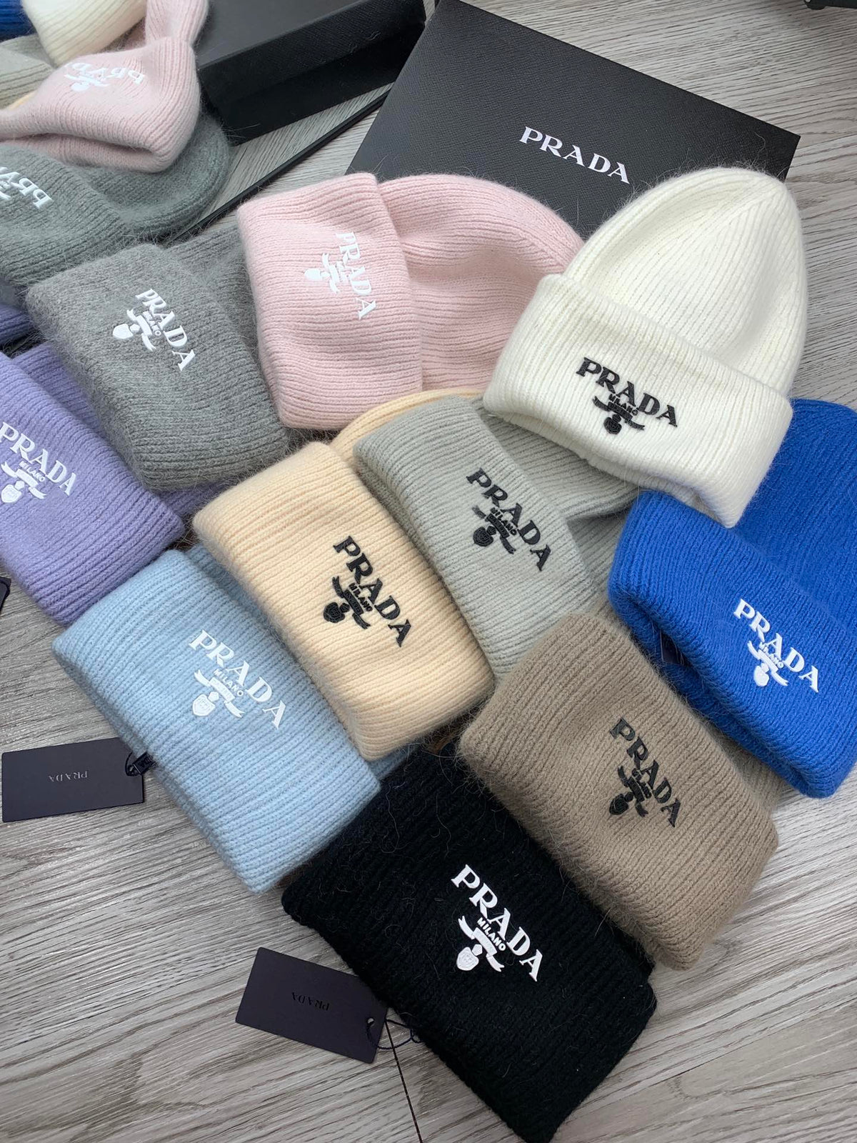 PRADA BEANIE HAT IN SOLF PINK WOOL 108751