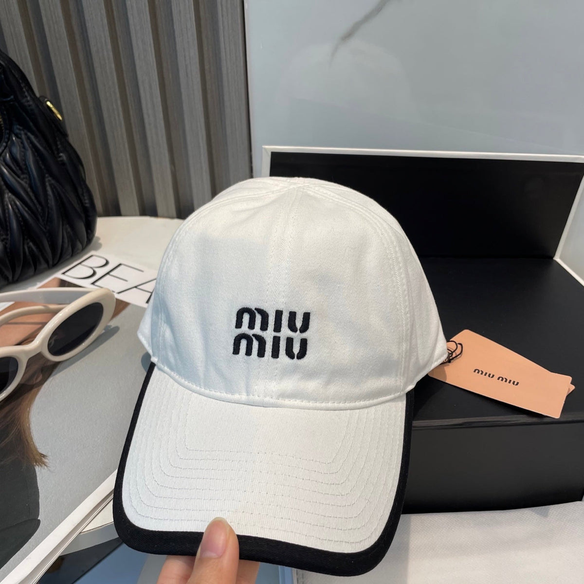 MIU MIU MM BASEBALL CAP IN WHITE AND BLACK FABRIC STYLE 1