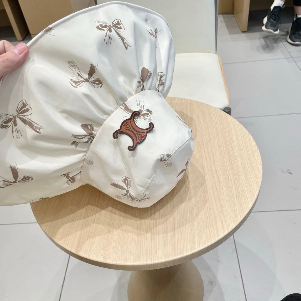 CELINE 25S BUCKET BOW HAT 733404 IN IVORY