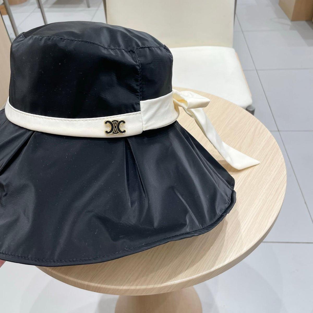 CELINE 25S BUCKET HAT 735019 IN BLACK